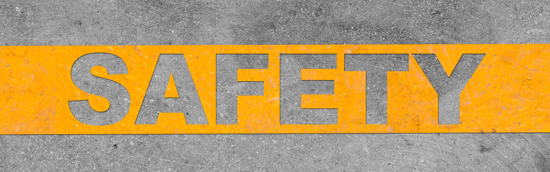 yellow stencil with the word safety