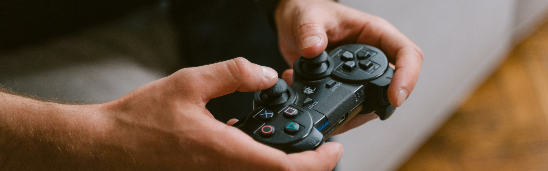 hands holding video game controller