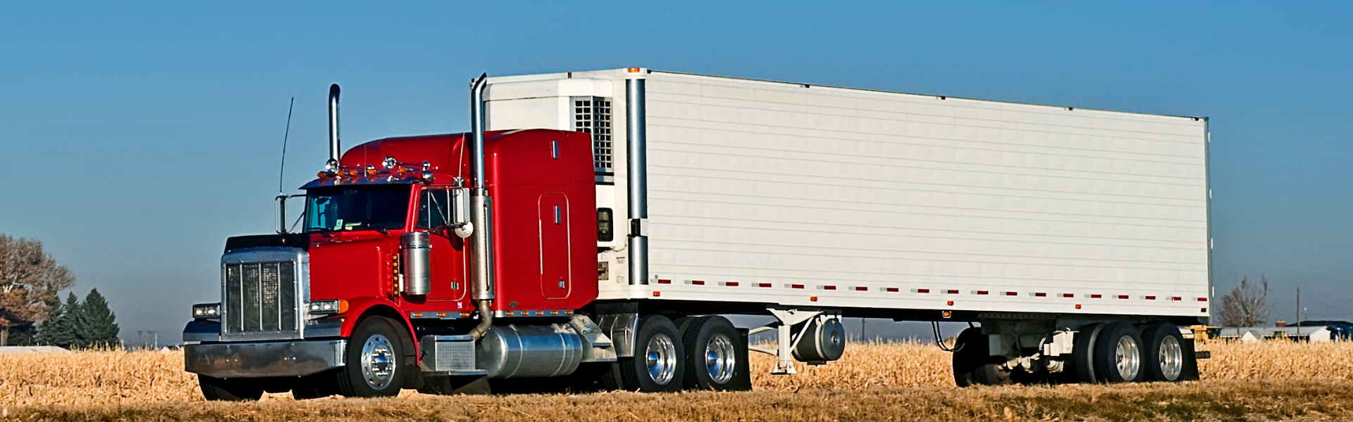 red semi truck on road