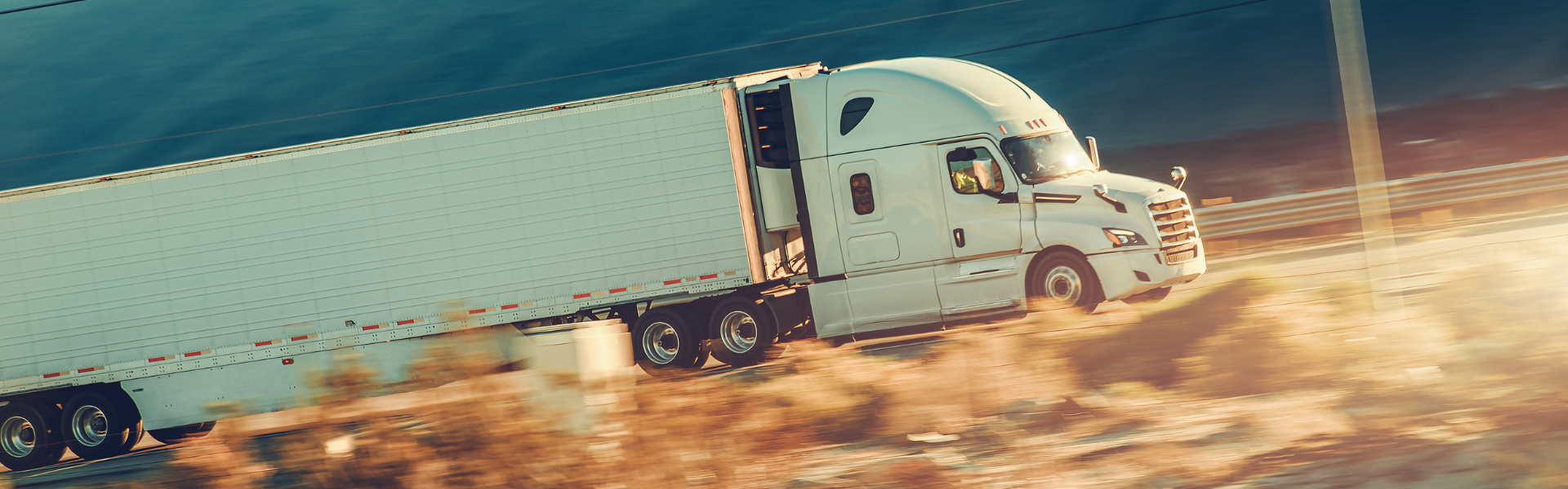 white semi truck on road