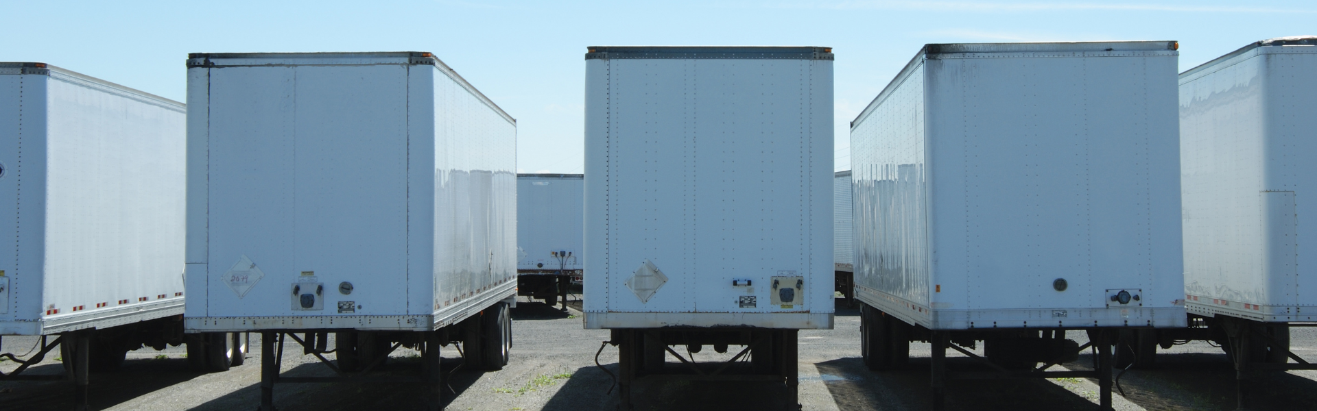 parked semi truck trailers
