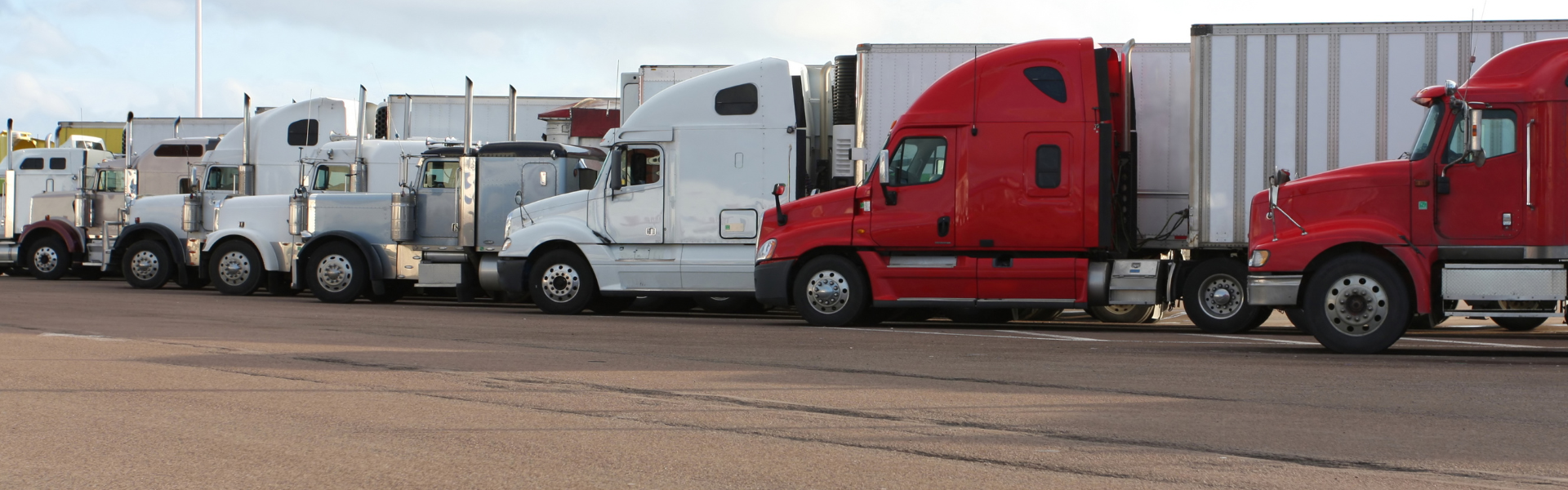 Trucks parked at truck stop parking