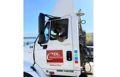 The Trucking Cares Foundation donated $25,000 to the South Dallas Driving Academy to support free driver education and CDL training for low-income students.