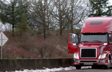semi truck pulled over by police officer