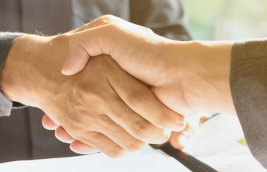 two people shaking hands