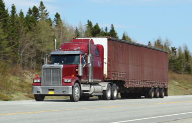red semi truck on road