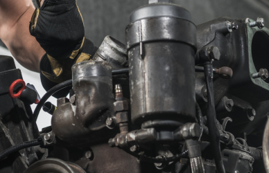 mechanic working on engine