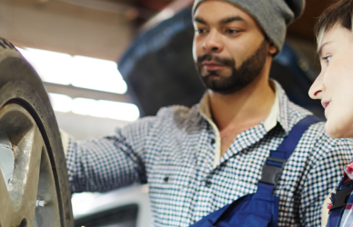 mechanic mentorship, male technician standing next to female technician near tire, The ASE Education Foundation is tackling the automotive industry's technician shortage through mentorship programs