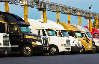 trucks at truck stop, who is really the world's largest truck stop, the rivalry between Iowa 80 Truckstop, the current champion of the world's largest truck stop, and a proposed 30-acre facility in West Dundee, Illinois