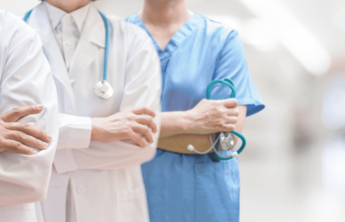Doctors with crossed arms and stethoscopes