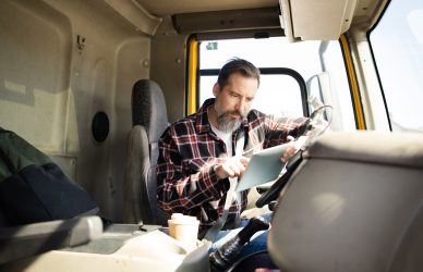 Truck driver checking log